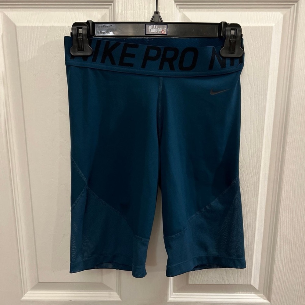 Nike pro shorts, biker style, has mesh covering on the side,